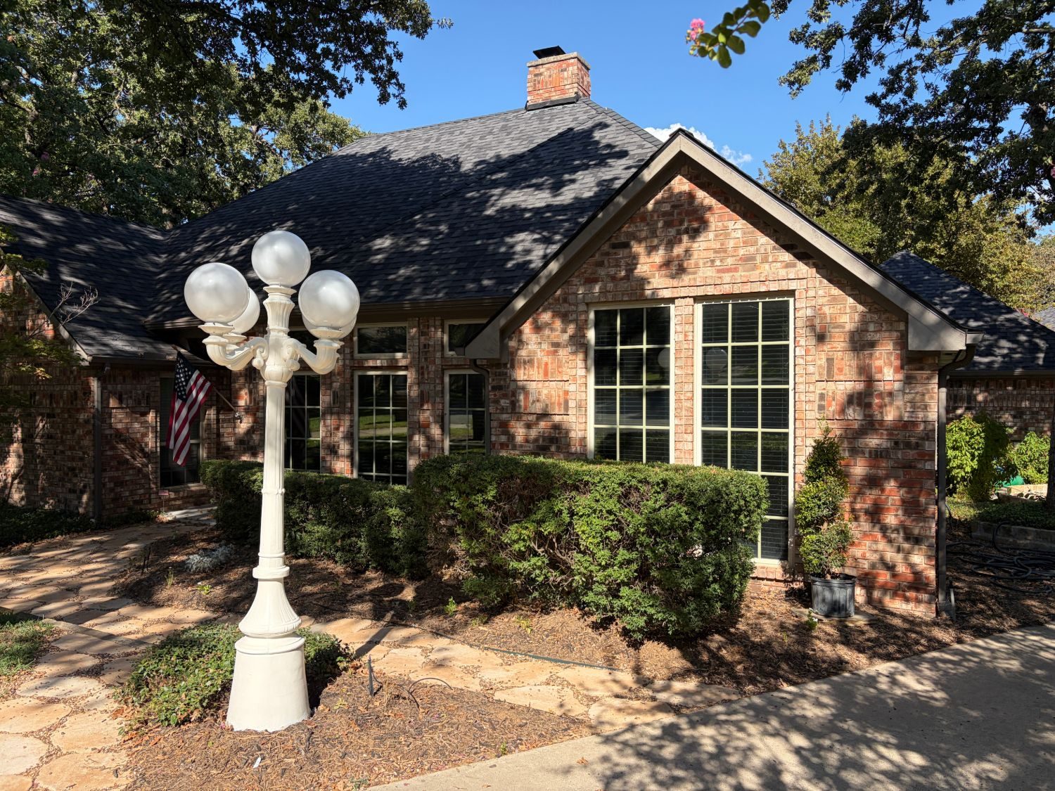 Street-facing windows on a brick home