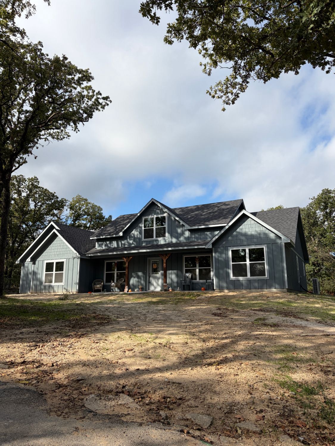 Farmhouse-style home exterior after residential window tint install