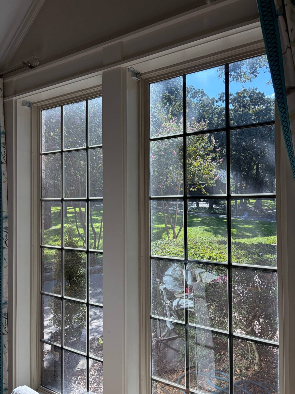 Grid-pattern windows with residential window tint installed