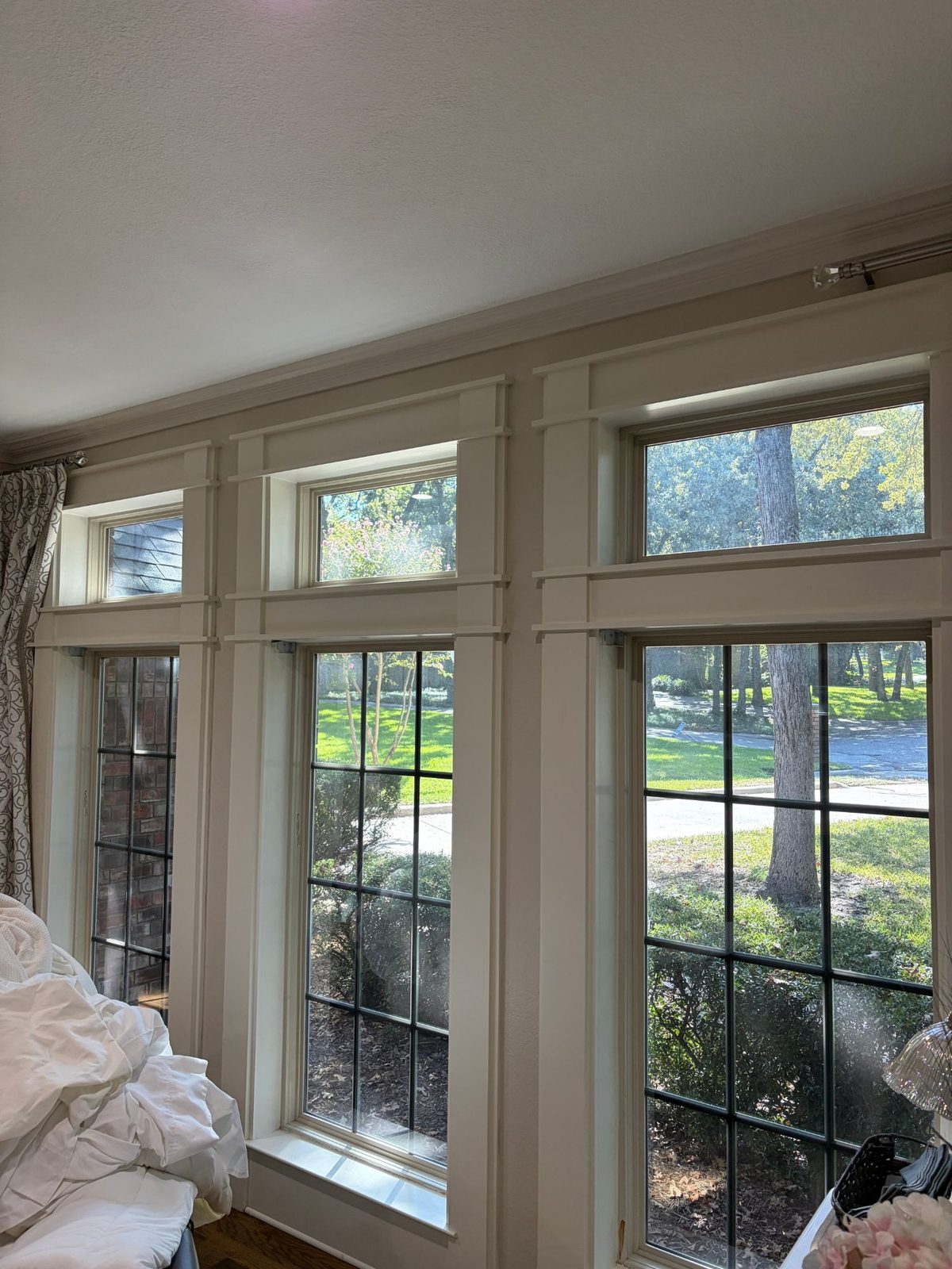Living room windows and transoms with solar film